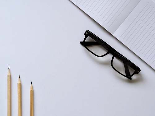 school room eyeglasses with black frames learning language